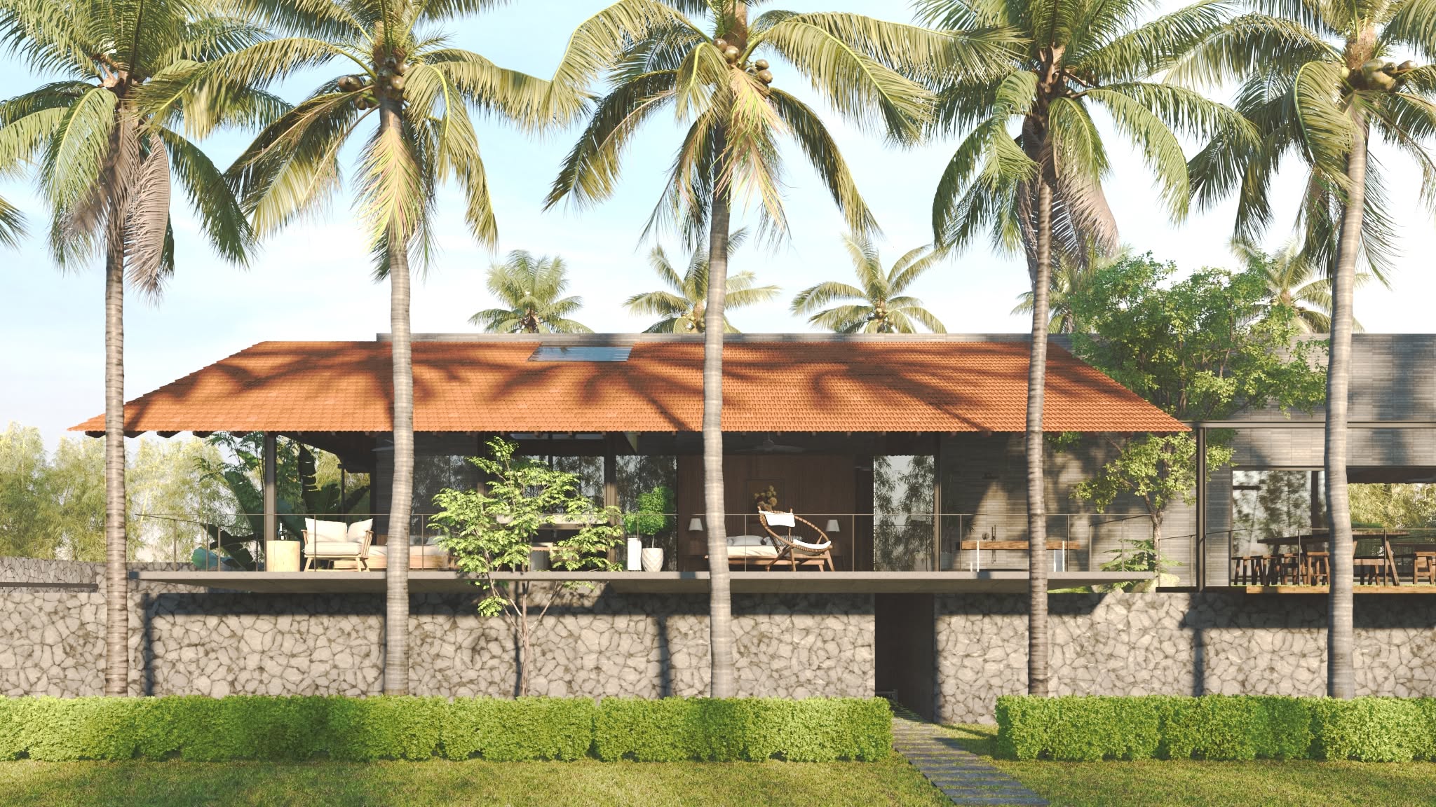Mái ngói đỏ dốc lớn của Hòa Long House giữa rặng dừa